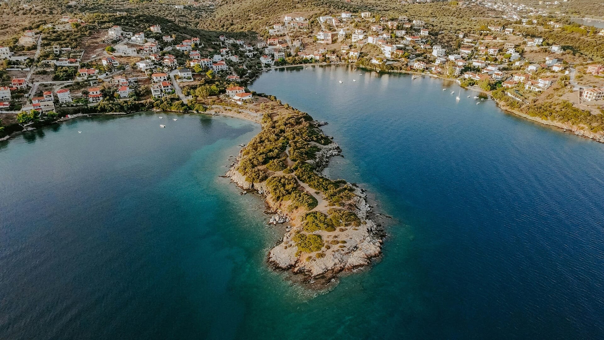 Trace untouched coastline where the land feels ancient and the sea feels yours.